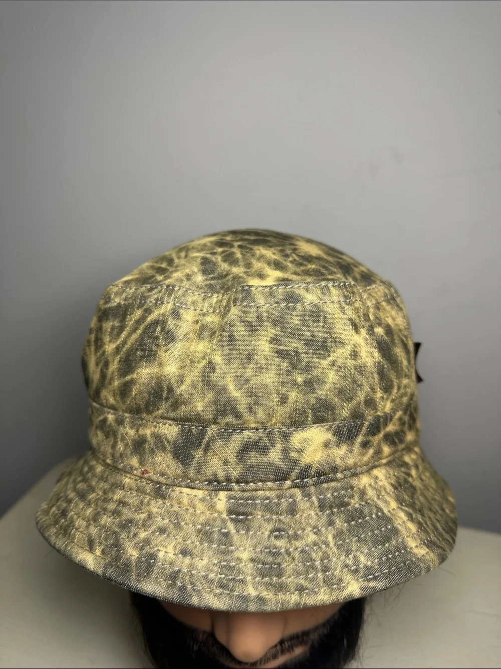 Kangol weathered canvas Yellow and Gray all over print Bucket Hat